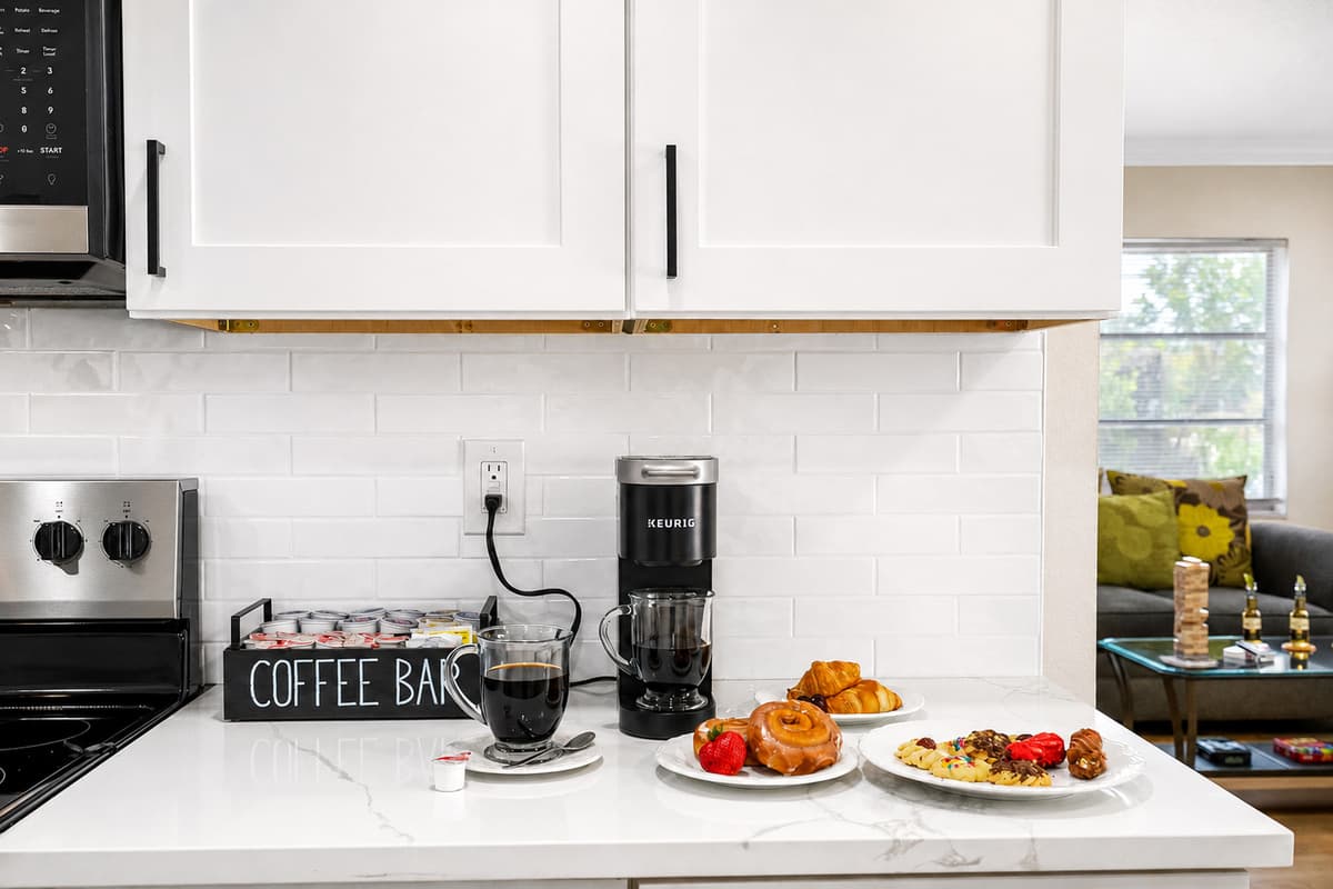 The heart of the home, this modern full kitchen is fully stocked and thoughtfully designed to meet all your culinary needs.