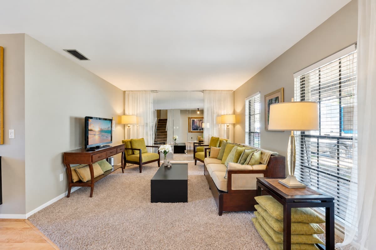 Comfort takes center stage with plush, inviting seating options strategically arranged to create an atmosphere of warmth and conviviality.