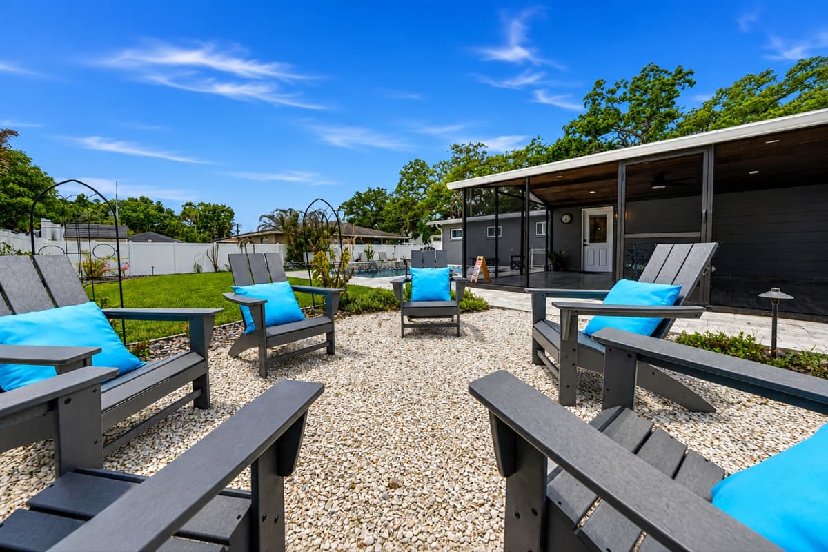 Cozy outdoor seating area beside the pool — ideal for evening gatherings and outdoor conversations.