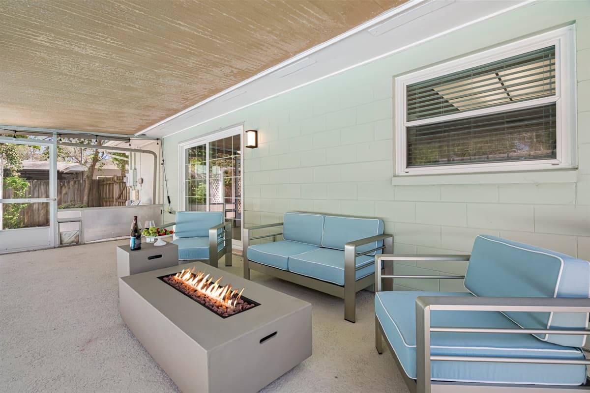As you sit and enjoy the warmth of the fireplace, you'll be surrounded by the beauty of the outdoors (Fire feature disabled per insurance requirements)