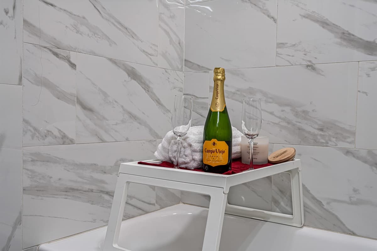 Relax after a very long and tiring day of travel and activities during your stay in this beautiful bathroom that has a sink, bathtub, vanity and shower! Send us a message if you have any questions regarding this property!