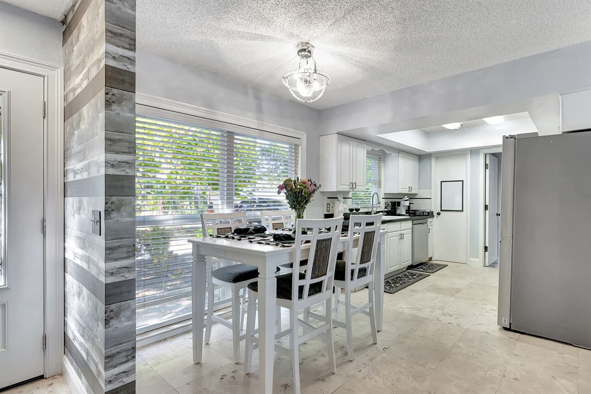 With comfortable seating for four, this cozy enclave sets the scene for shared laughter, delicious cuisine, and cherished moments.