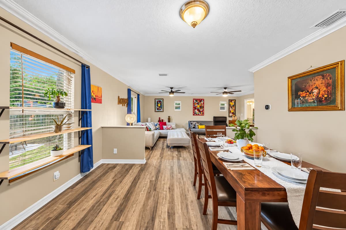 Spacious dining area with large table and natural light—perfect for group meals and gatherings.