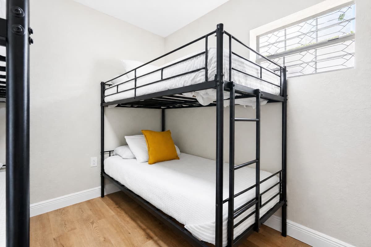 The layout leaves plenty of floor space for spreading out belongings or enjoying a board game or quiet activity before bed.