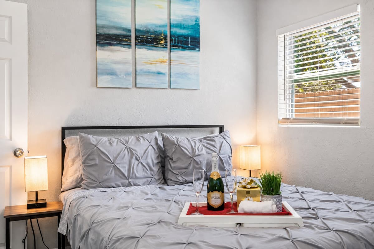 The inviting bed, with its soft linens and fluffy pillows, is the perfect place to unwind after a long day of exploring.