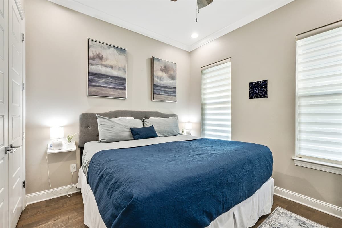 Experience the perfect blend of comfort and style as you unwind in the embrace of the queen-size bed and immerse yourself in the tranquil ambiance of this charming bedroom.