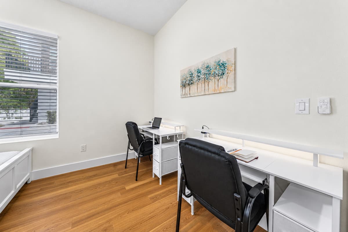 A versatile dining and meeting space with seating for four — perfect for meals, games, or planning your day.