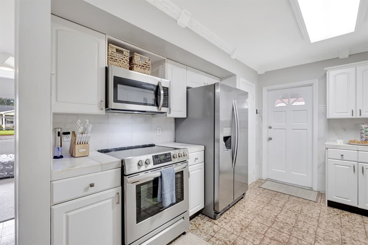 From the sleek refrigerator to the state-of-the-art oven and dishwasher, every element is designed to elevate your cooking experience to new heights.