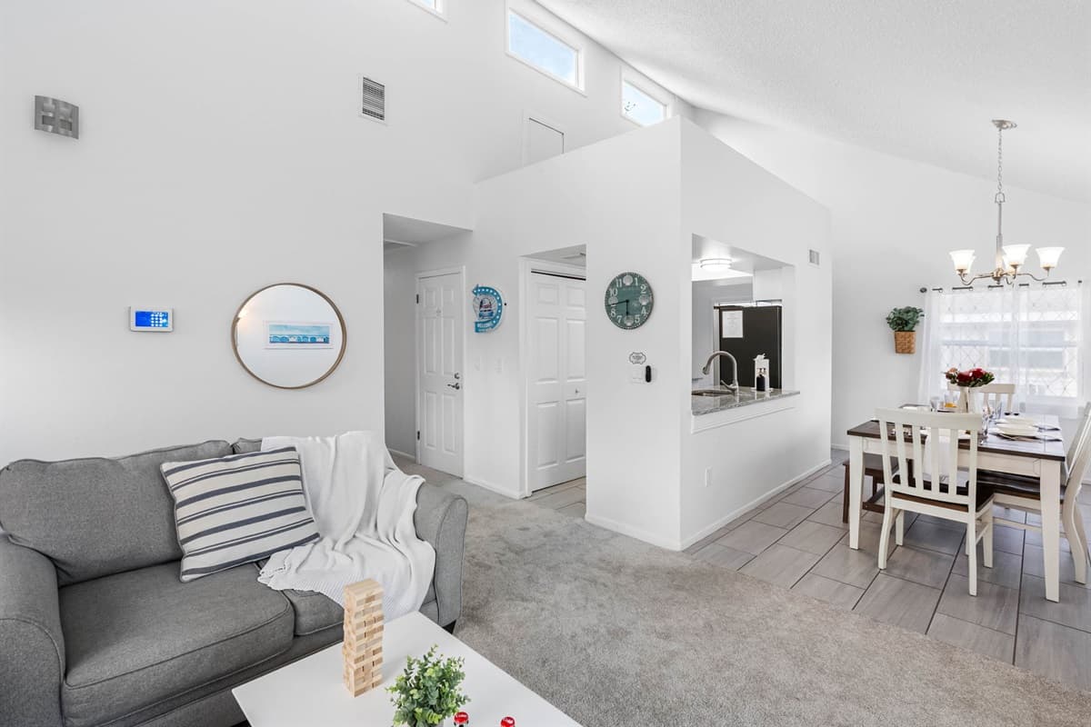 Seamlessly connected to the dining area, this open-concept living room is perfect for family gatherings, movie nights, or game nights.