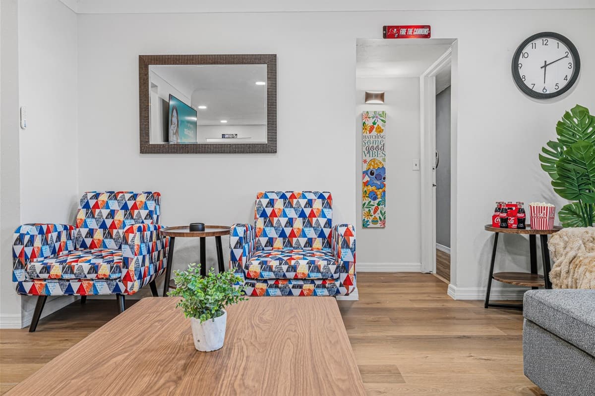 Additional seating area with accent chairs—perfect for relaxing or casual conversation 