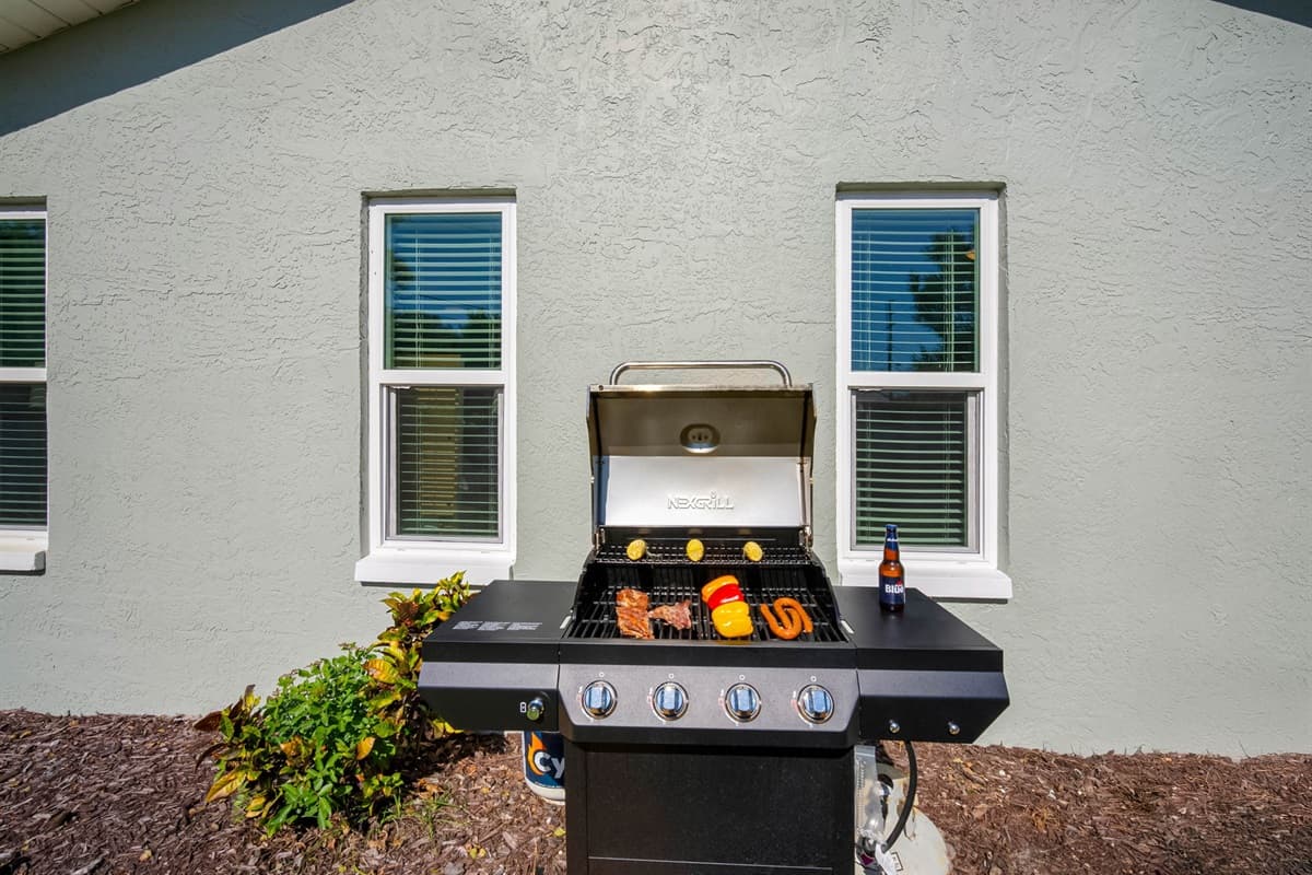 Fire up the grill and enjoy outdoor dining with a full-size propane barbecue—perfect for family cookouts and Florida sunshine.