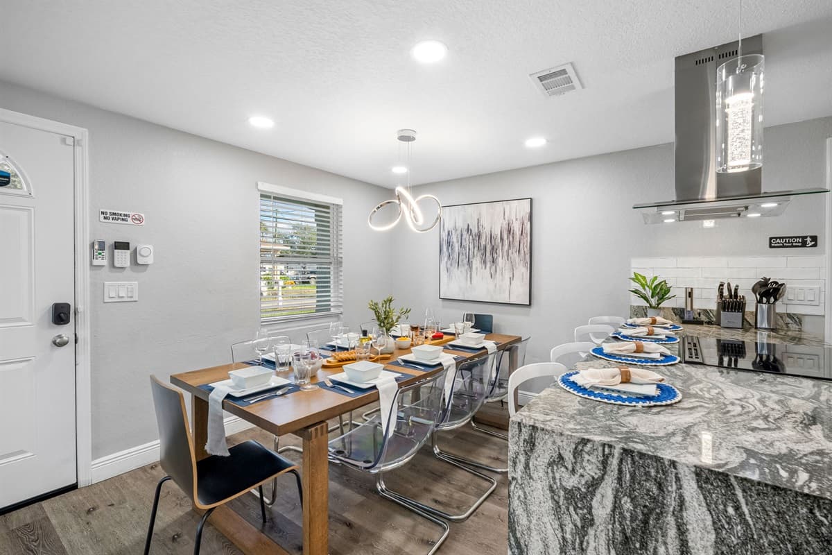 The open layout allows guests to dine, chat, and cook together, creating a warm and social environment.