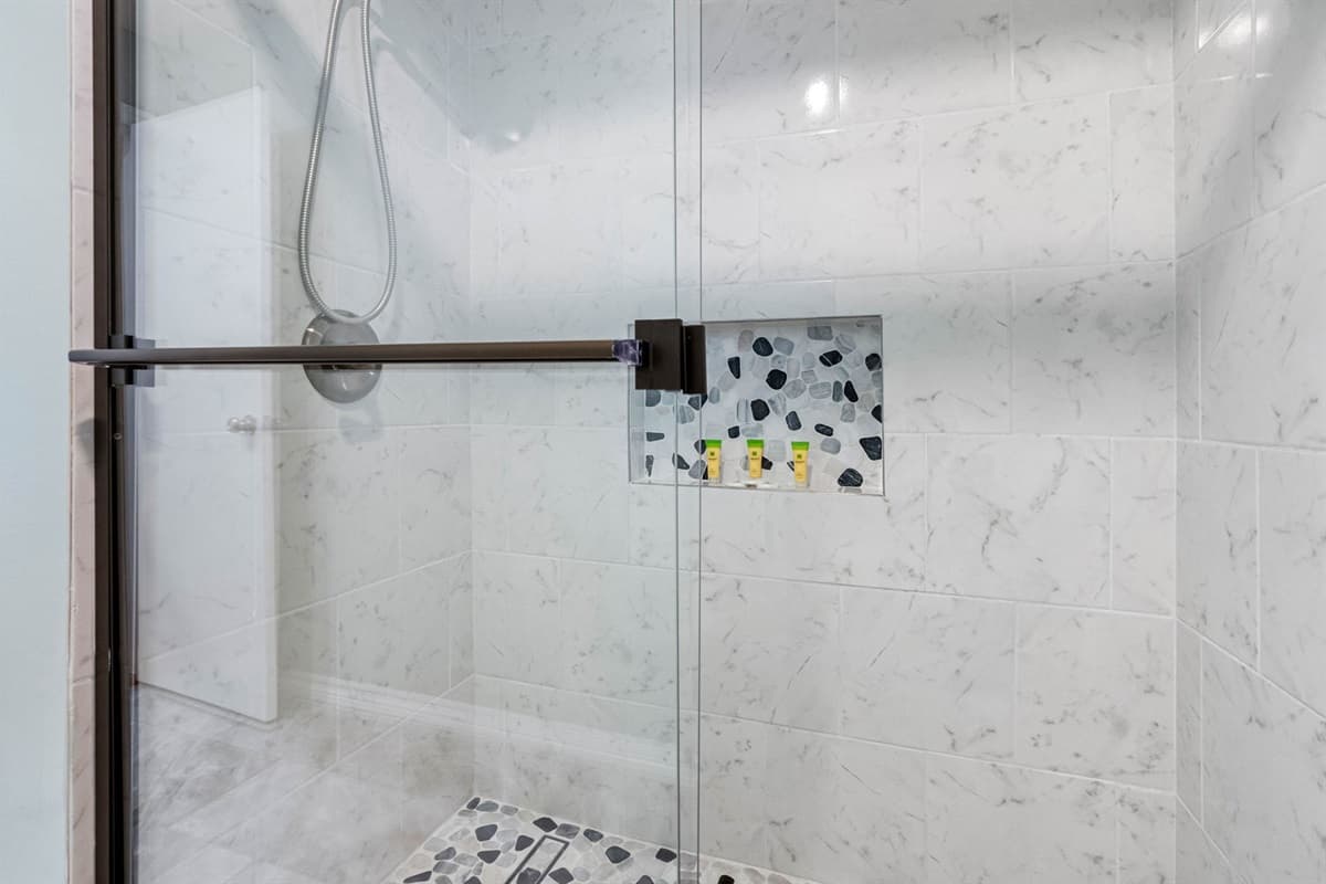 Thoughtfully updated with modern features and tasteful finishes, this bathroom provides both convenience and comfort for your stay.