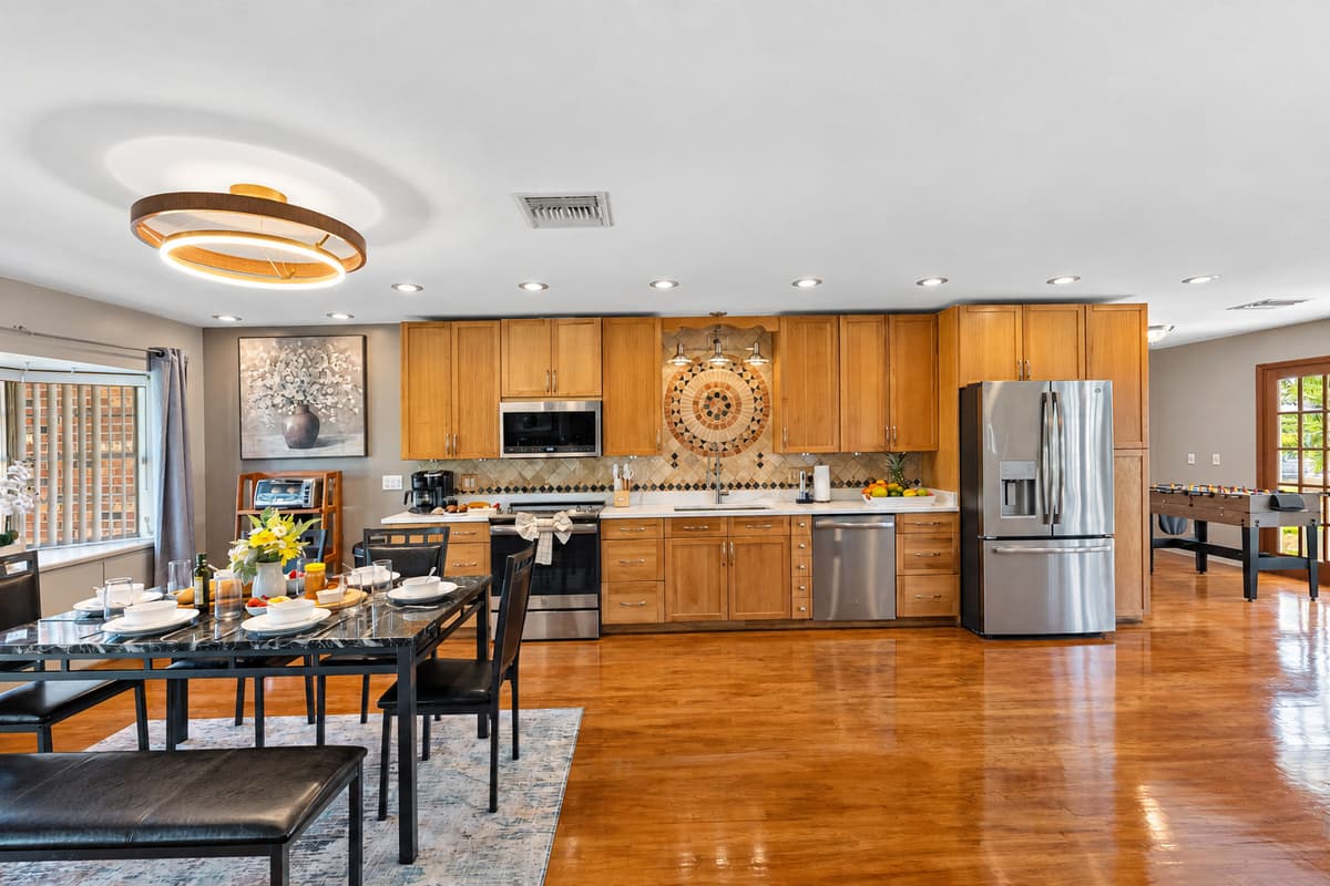 An open layout with plenty of counter space and a full dining area nearby makes this kitchen ideal for gatherings and family meals.