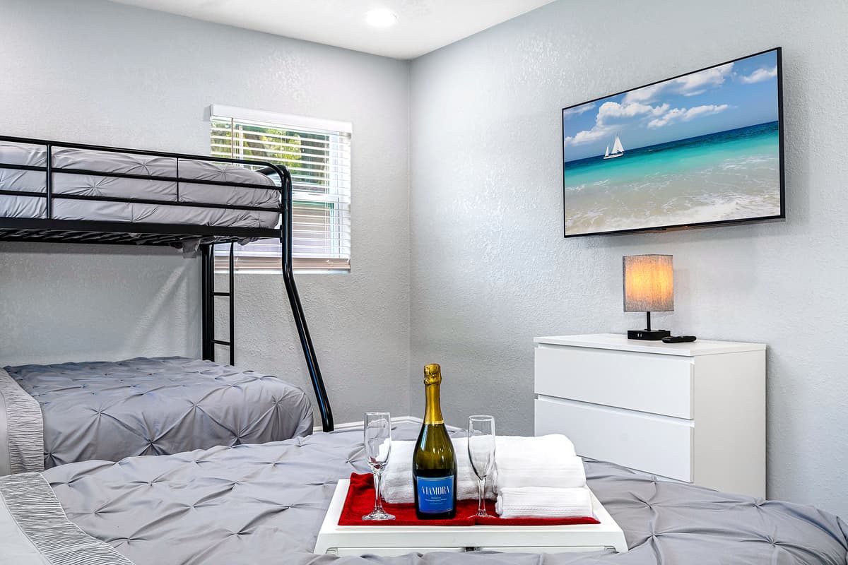 Friends are joining you for vacation? This amazing room is great for them! It has double sized bed, single over double bunkbed, smart TV and drawers for storage, great for sharing! Book now!