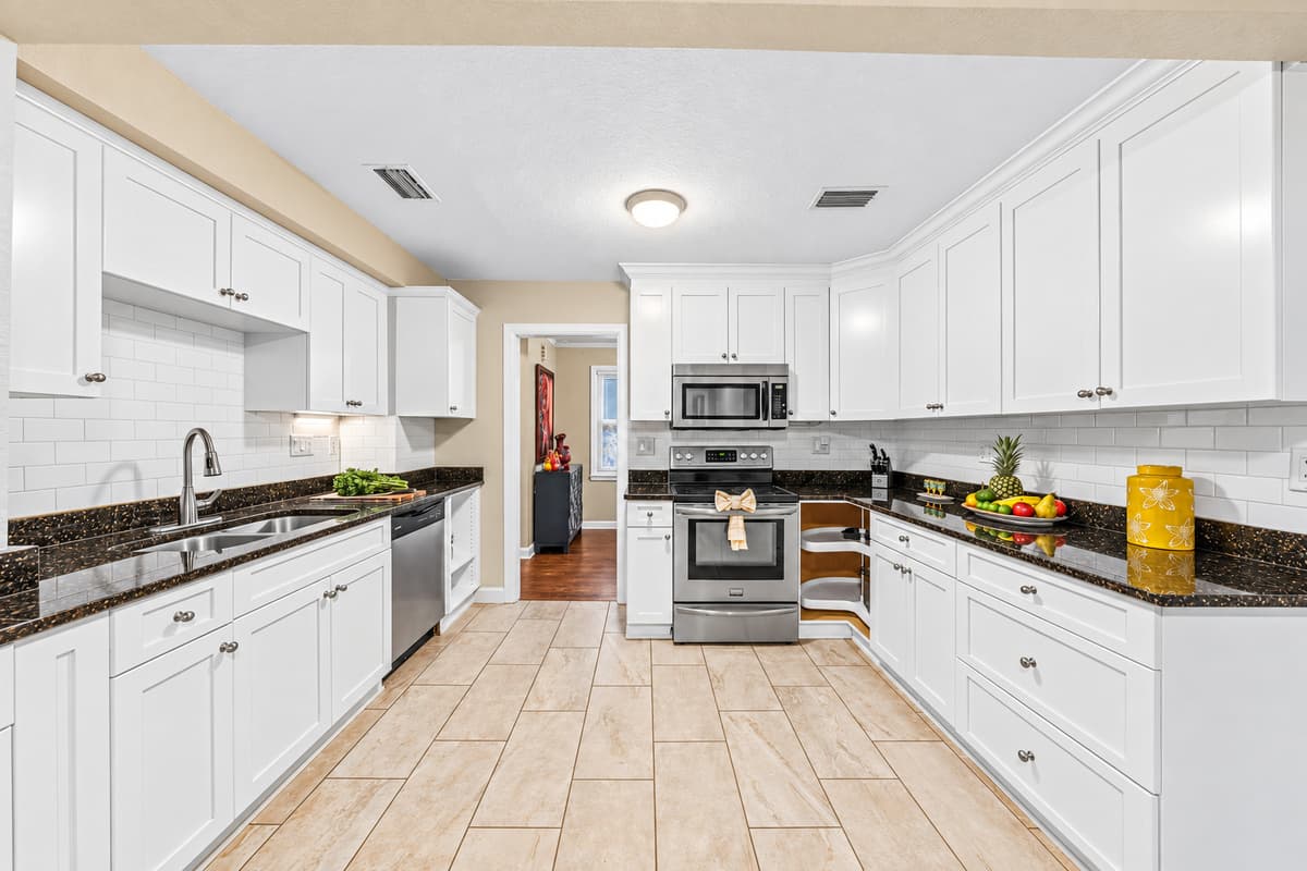 Expansive kitchen layout with plenty of prep space, perfect for group cooking and entertaining.