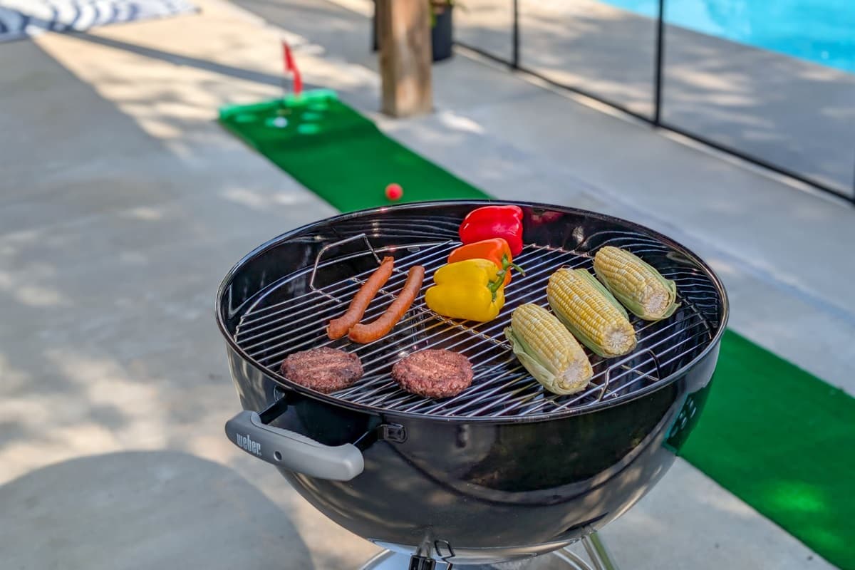 Whether you’re grilling, lounging, or playing games, there’s something for everyone in this backyard.