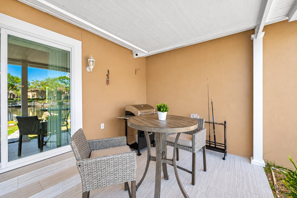 Outdoor sitting/ dinning area. Enjoy the view of the lake while having a chat, snacks or even meals with family and friends. Created impeccable memories in this wonderful property. Send us an inquiry now!