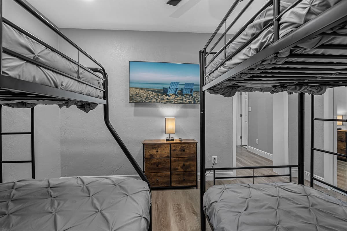 New setup for this bedroom: 1 queen bed and 1 bunk bed (twin over twin). New photos coming soon!