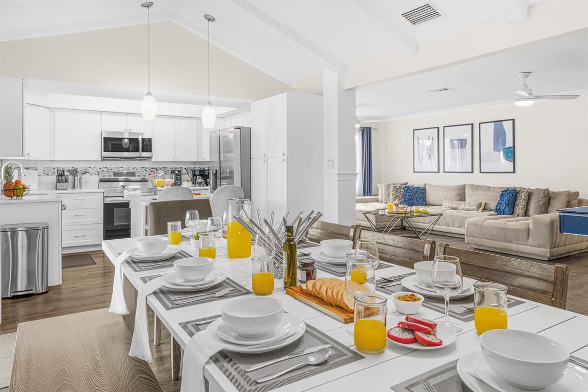 Open-concept dining, kitchen, and living area designed for effortless entertaining.