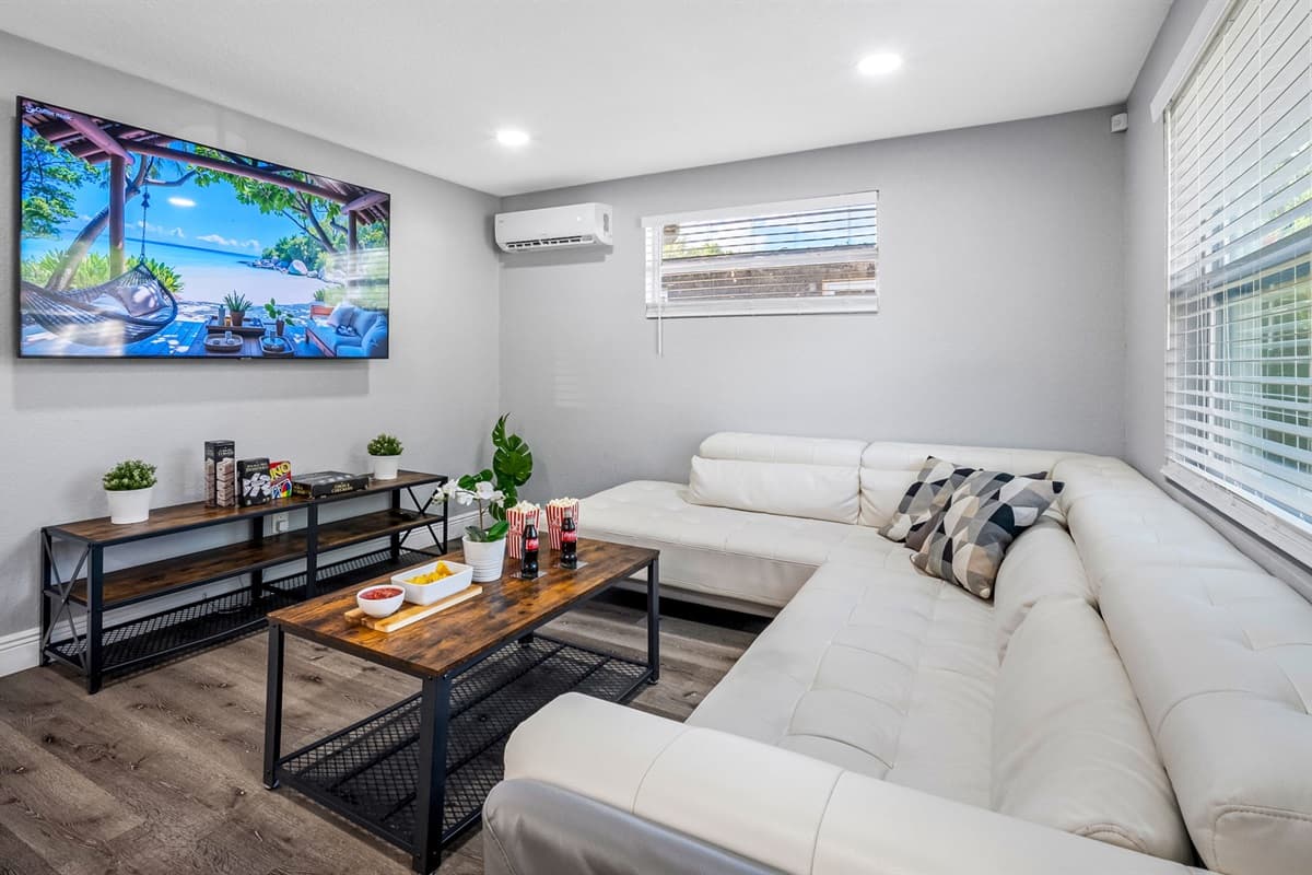 Ideal for family hangouts or game nights, this living space combines comfort and style effortlessly.