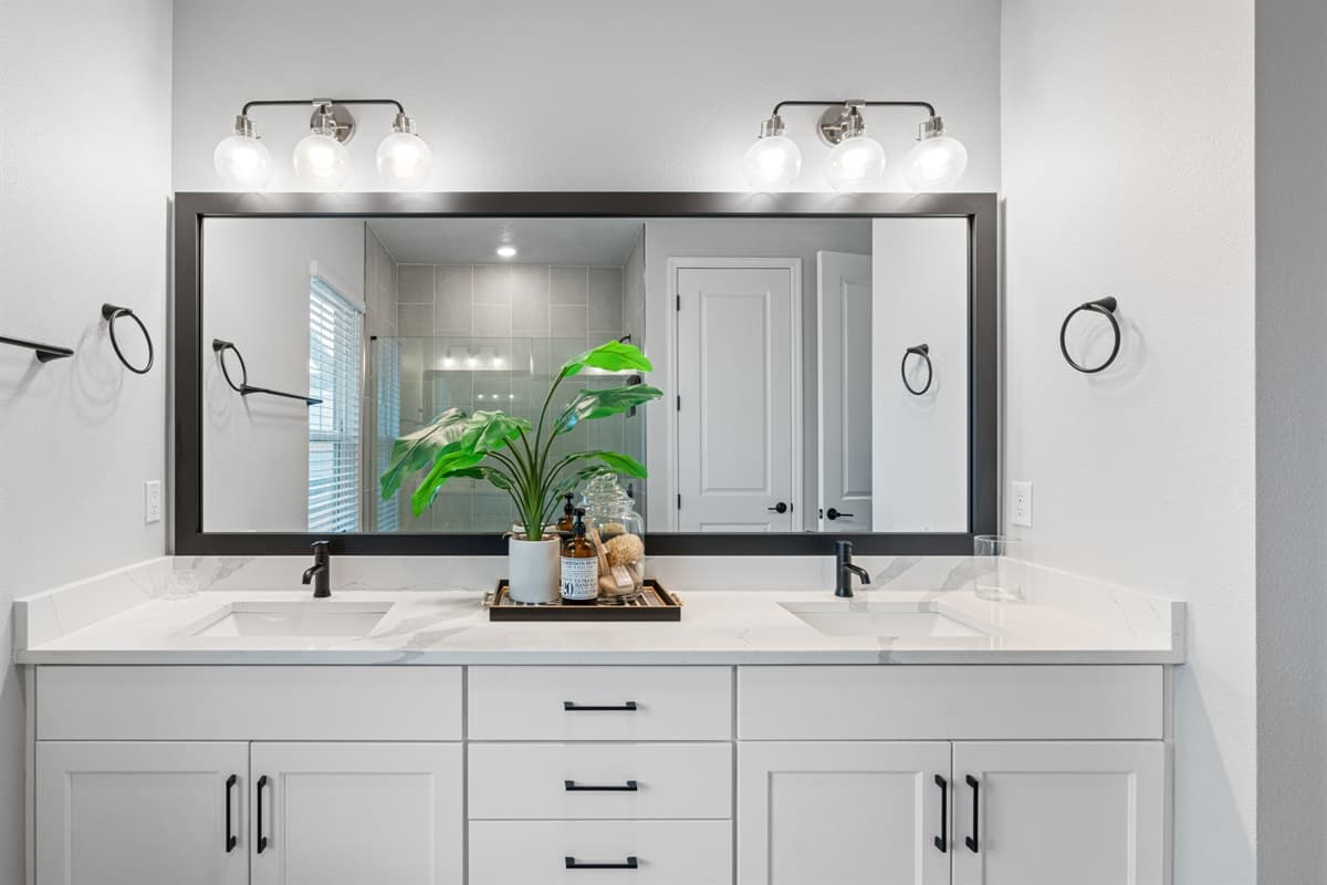 Study in modern elegance, with sleek lines, contemporary fixtures, and luxurious finishes that create a sense of timeless sophistication.