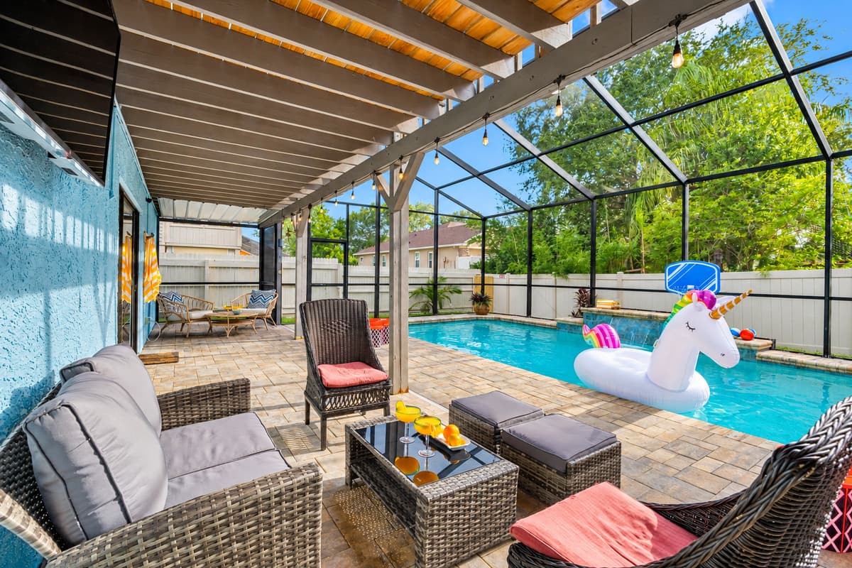 From plush loungers and patio swings to the floating unicorn in the pool, this outdoor area brings the fun for guests of all ages