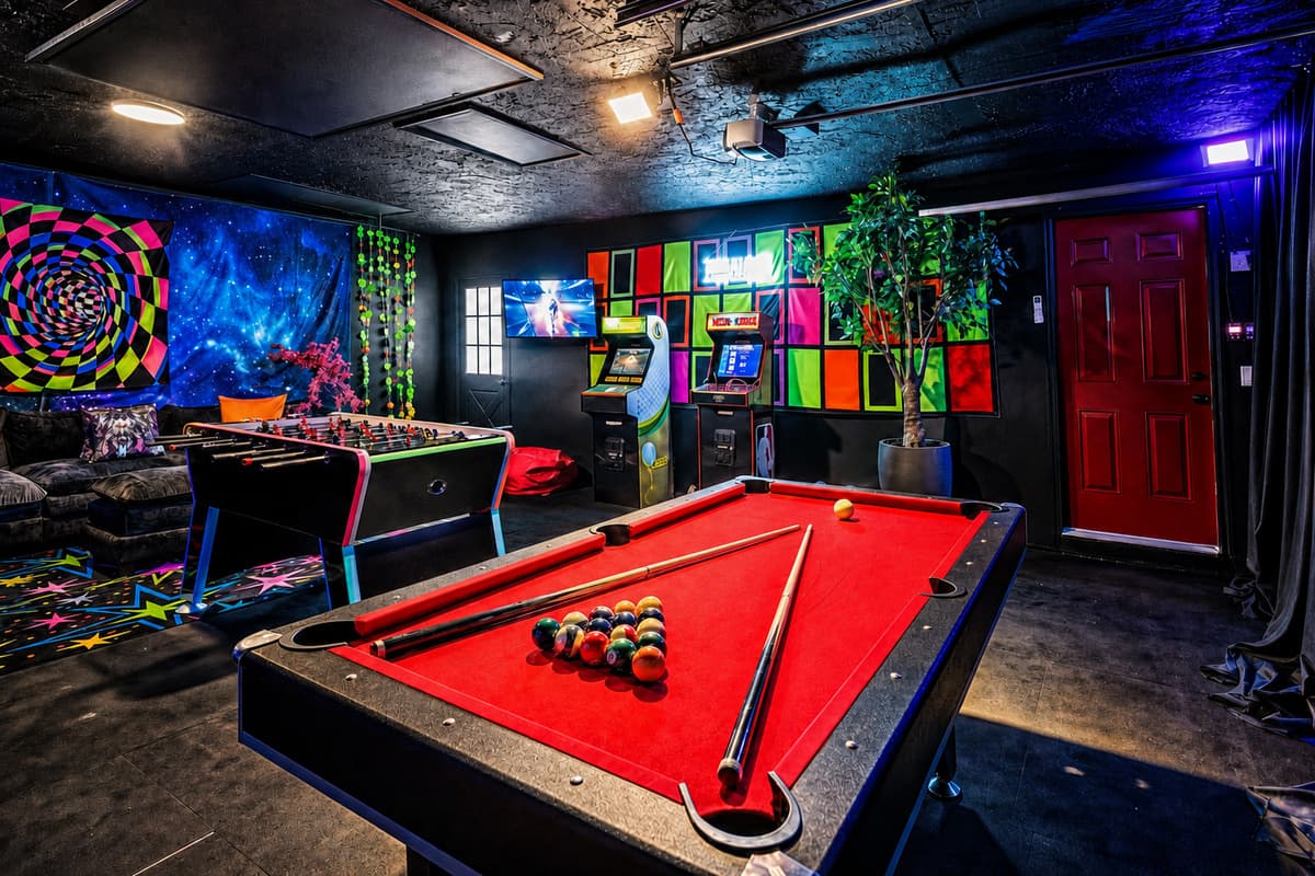 Rain in the forecast? Pool, foosball, arcade, and a sofa for whoever's waiting their turn.