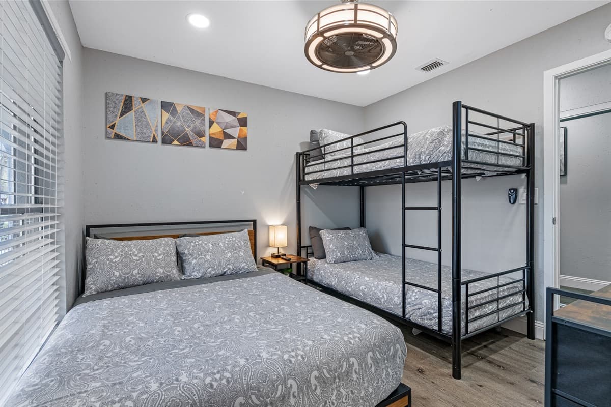 Single bunkbed and a queen size bed for a small family or a group of friends who wants to hang out and sleep in one room. It is very spacious and has a very nice view. If you are interested to book this house, Send us a message now!