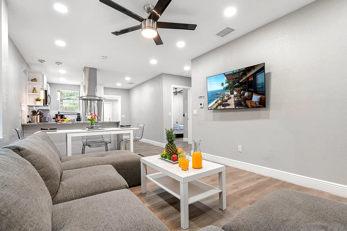 Spacious L-shaped sectional in the living room — plenty of seating for the whole group.