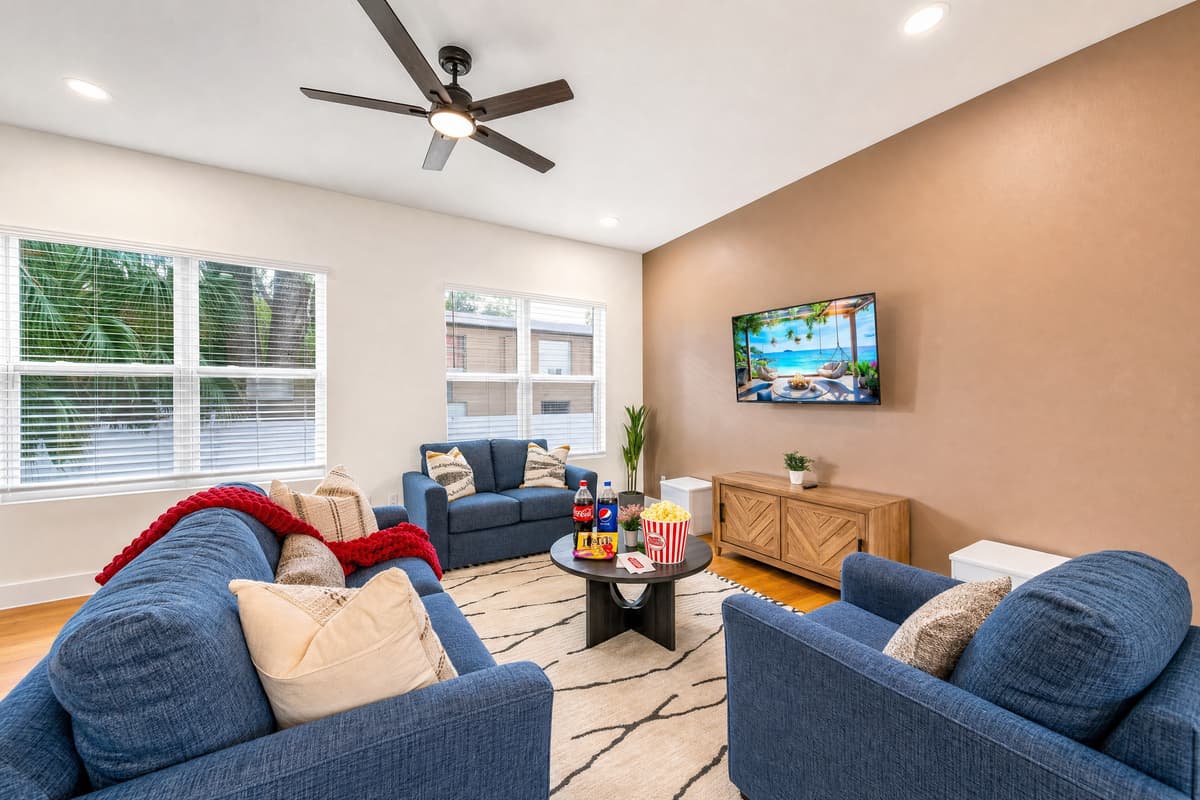 Three sofas, one big screen, nobody fights over a seat on movie night