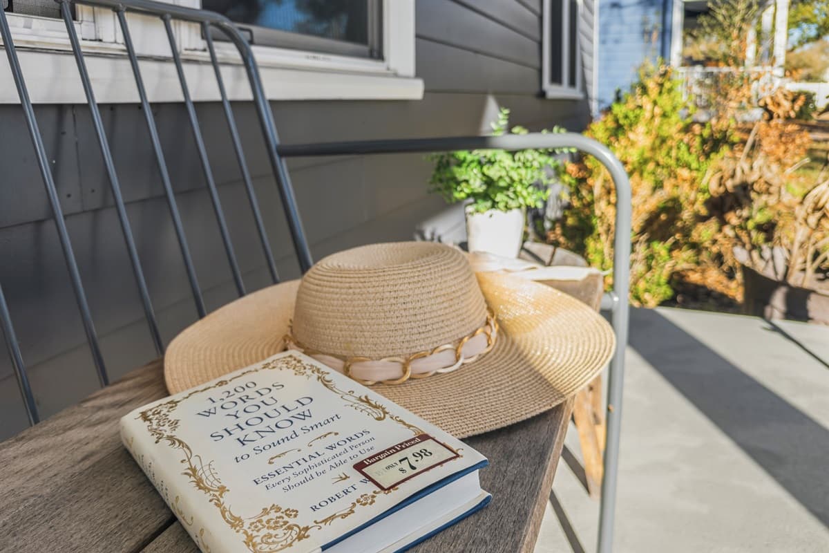 Grab your coffee and a good book — the outdoor swing chair surrounded by lush potted plants is the perfect slow-morning spot at this brand-new Seminole Heights home. Pure Florida relaxation awaits.