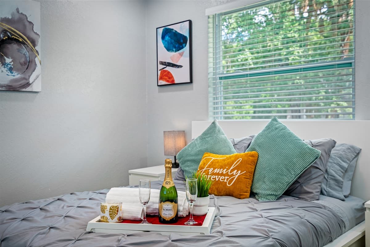 Exquisite bedroom with queen size bed, drawers, full sized mirror closet, and smart TV. Feel comfortable during your stay while making wonderful memories with family and friends. Don't hesitate to send us an inquiry about the property now!