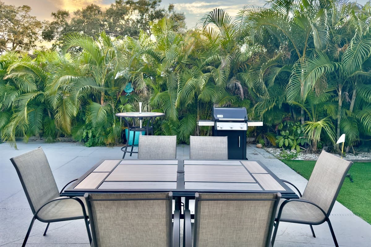 Ample seating lines the pool deck, offering plenty of space for group gatherings or quiet relaxation.