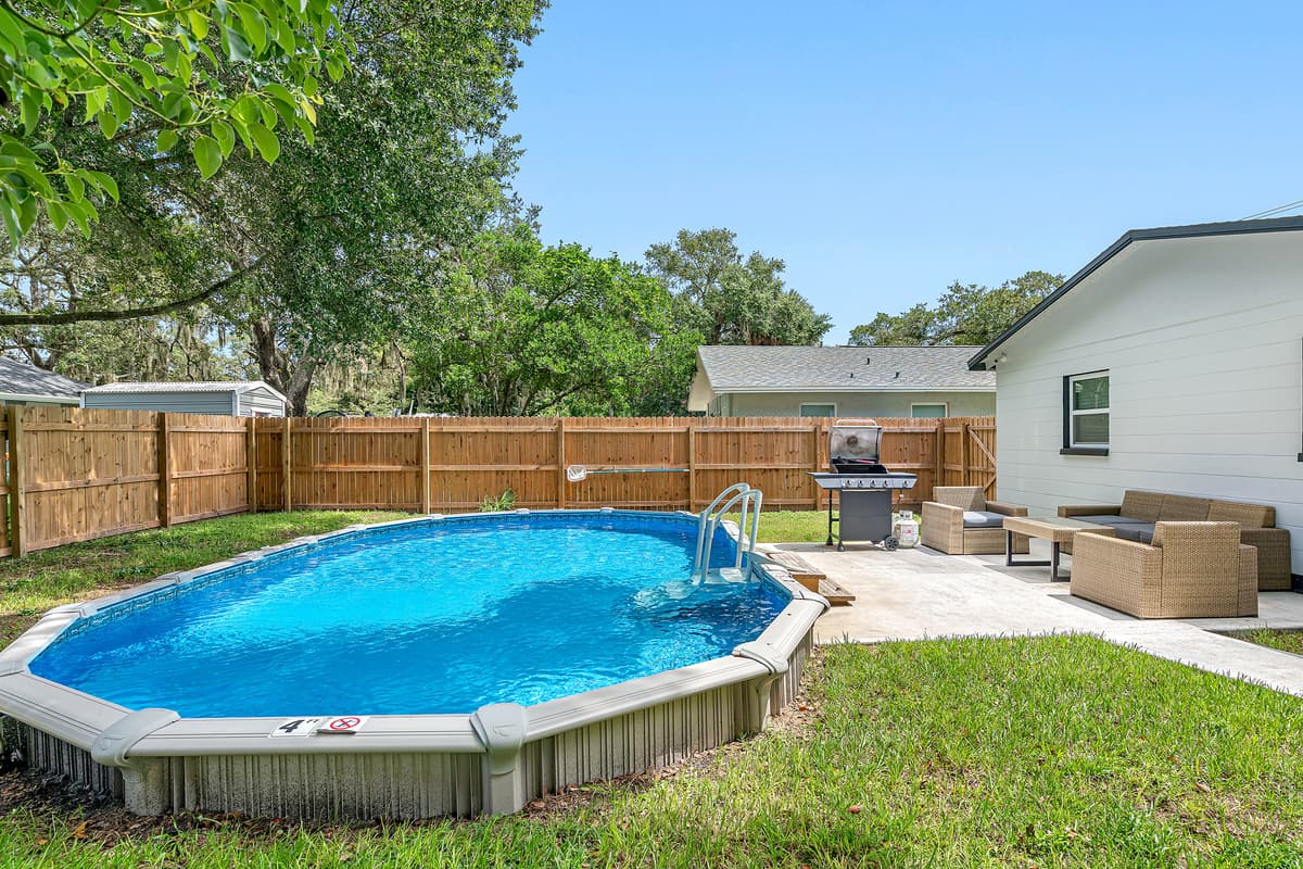 Let the kids play in this fully fenced backyard without worrying about their safety. Have the best time of your vacation in this beautiful property with an immaculate heated pool! Inquire now!