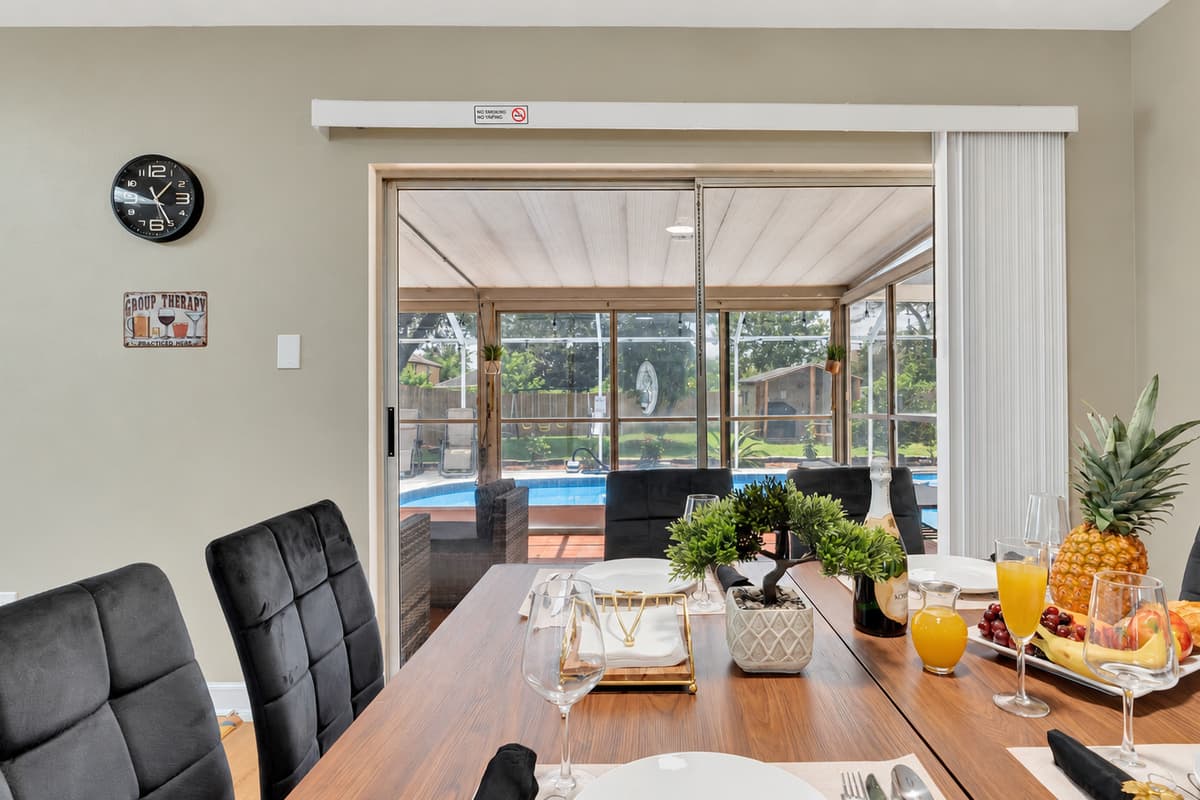 Imagine the possibilities as you dine in style, with the refreshing allure of the patio and pool just a slide away!