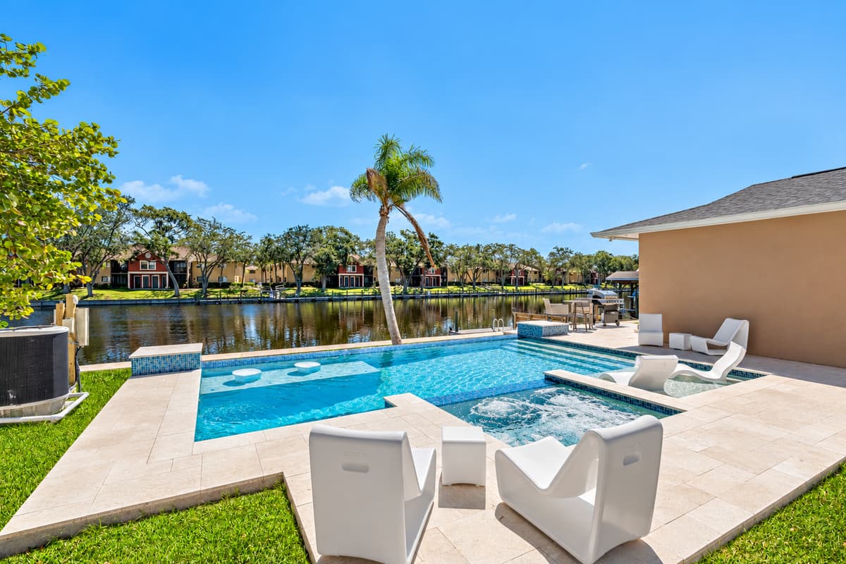 Have the best time of your vacation in this beautiful property with an immaculate heated pool, while enjoying the wonderful view of the lake! If you like what you see, send us an inquiry!