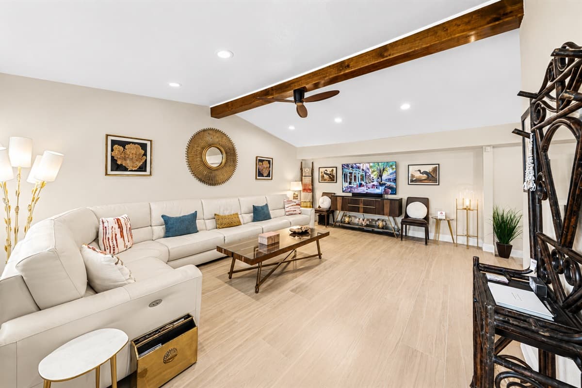 Bright and inviting living area perfect for gathering, relaxing, and enjoying movie nights together.