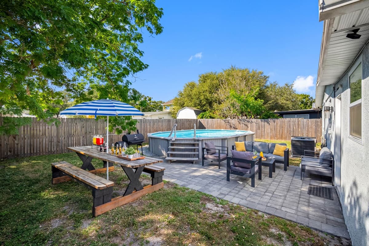 Relax to the gentle sound of rippling water in your serene backyard haven.