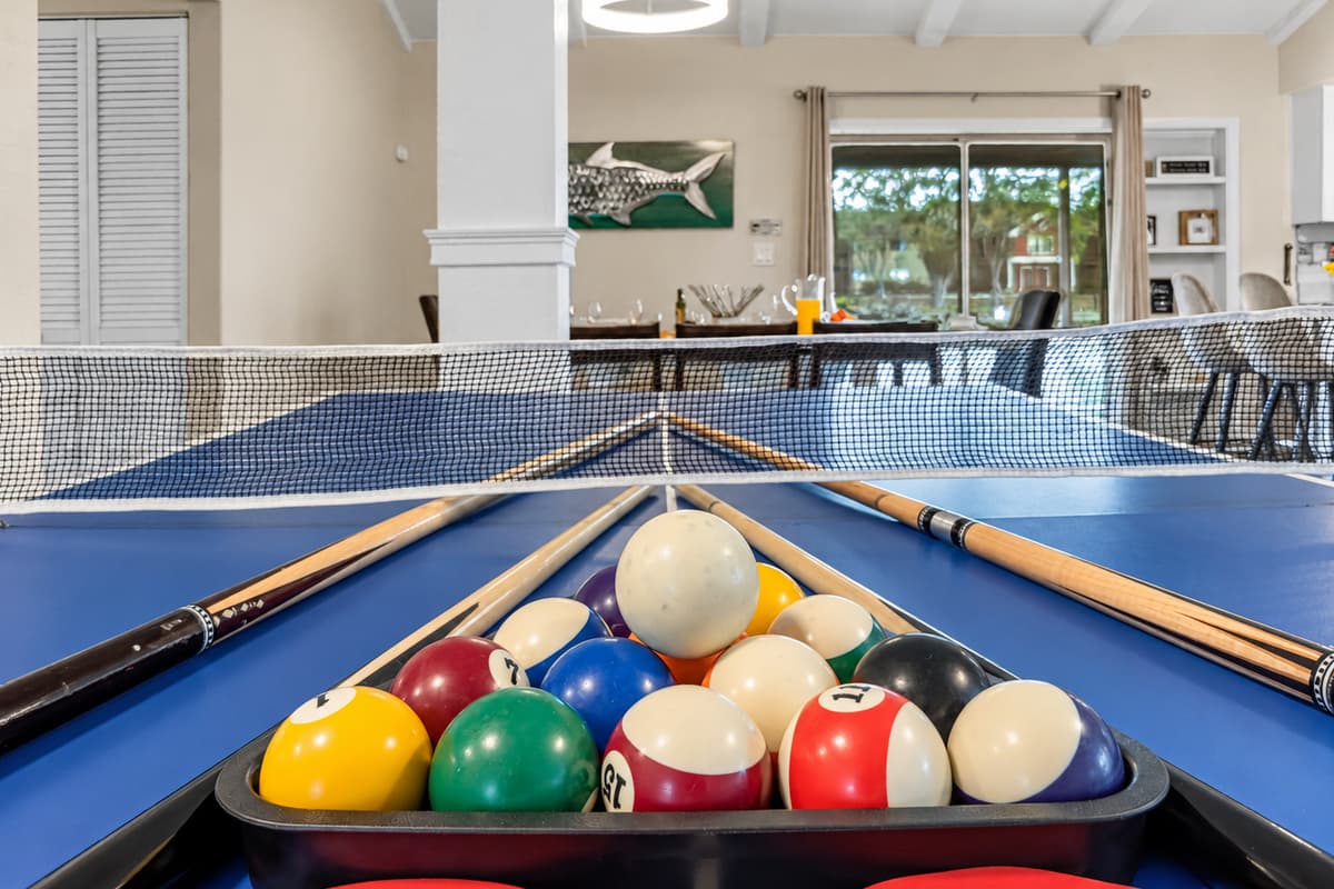 Pool table and open-concept layout create the perfect setting for memorable group getaways.