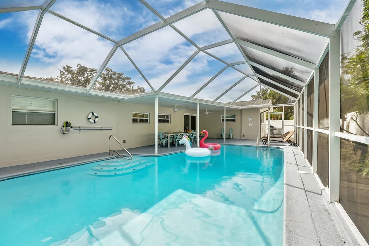 The pool area is not just a place for swimming; it’s a versatile space for socializing and unwinding.