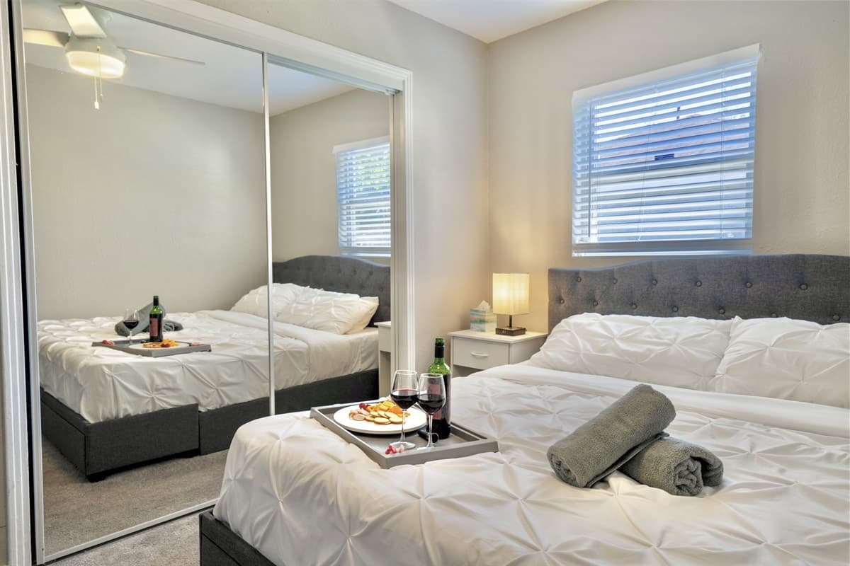 With tasteful decor and thoughtful touches, this bedroom is designed for relaxation and peaceful repose.