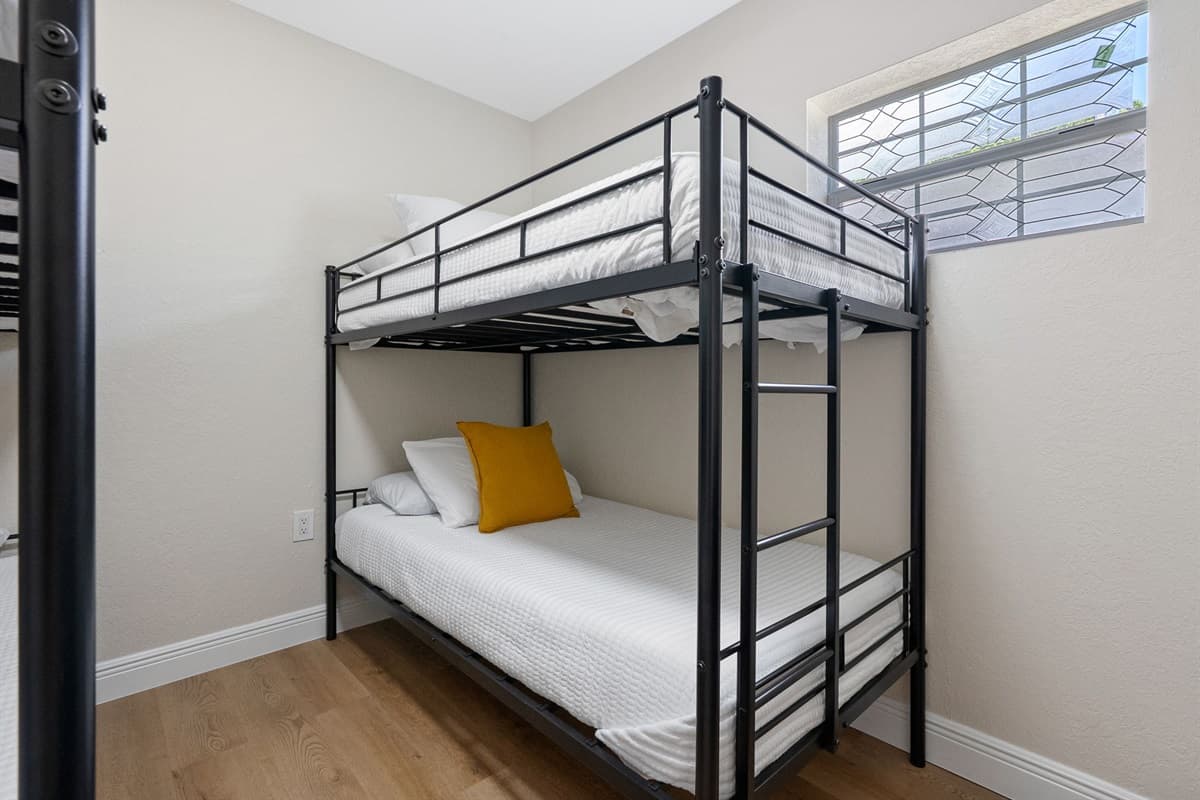 The layout leaves plenty of floor space for spreading out belongings or enjoying a board game or quiet activity before bed.