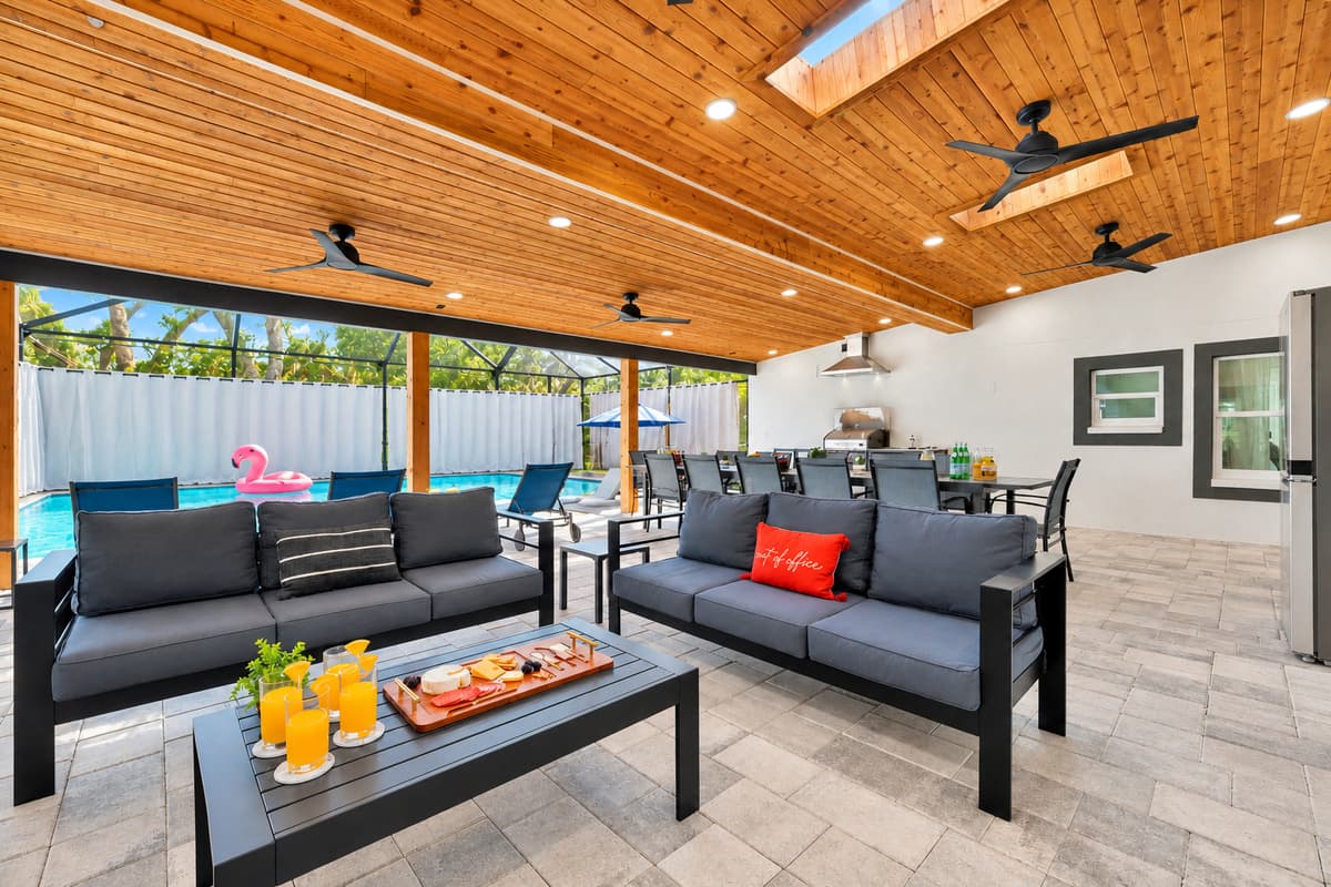 Fans overhead, pool at your feet, and the kind of afternoon that doesn't need a plan.