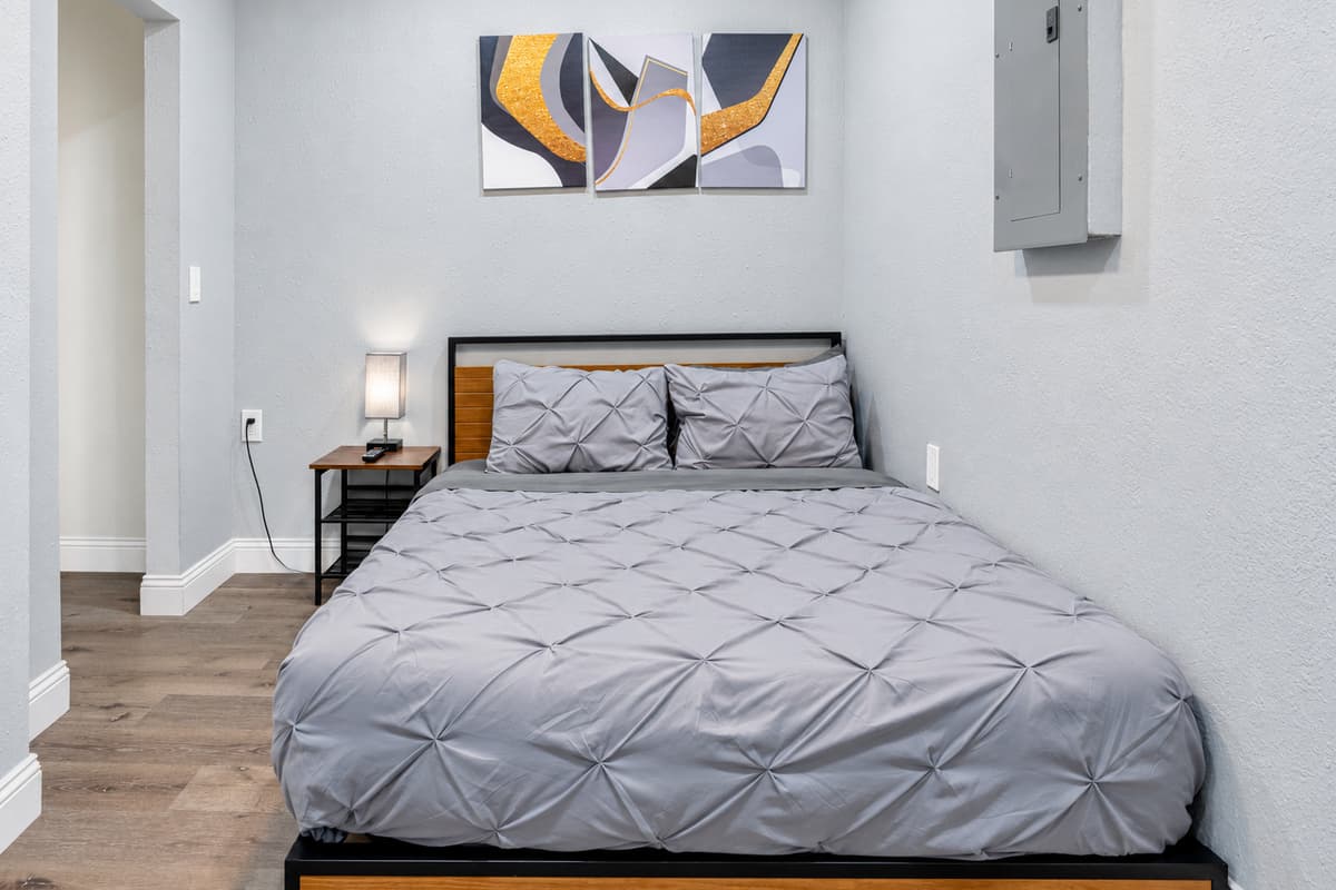 Feel comfortable and safe in this gorgeous bedroom that has a queen sized bed, drawers for storage, and its own TV! Its like sleeping in your home away from home! Book with us now!