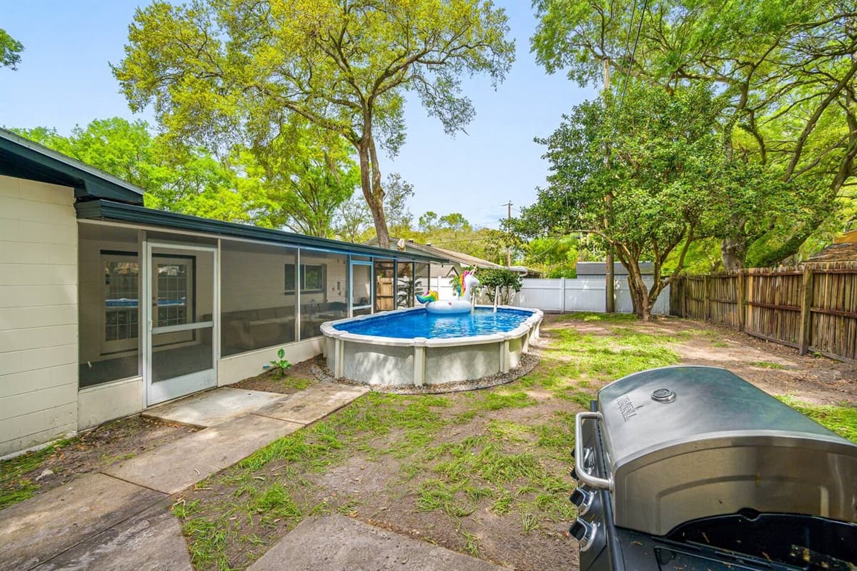 Lovely backyard with comfortable sitting area and griller. Enjoy good food while bonding with family and friends without worrying about the cold weather. If you like this property, send us an inquiry now!