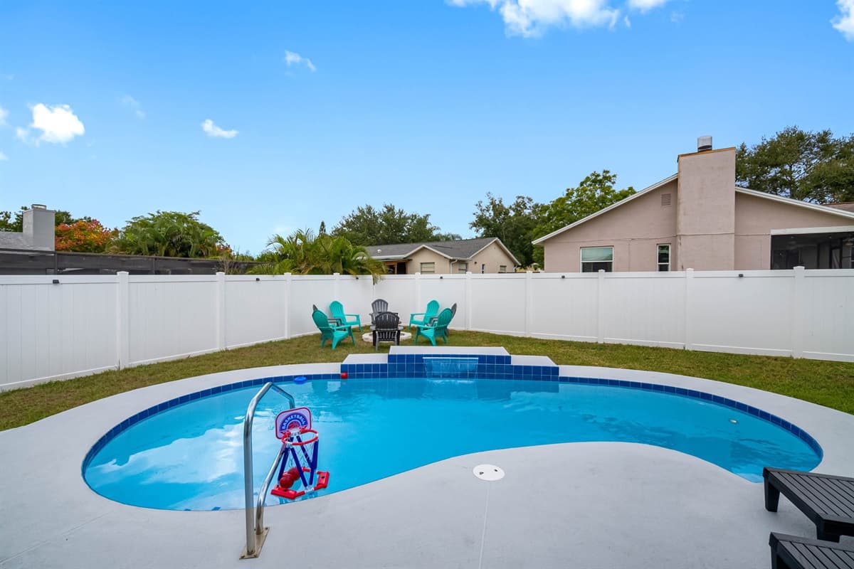 Your private paradise — calm blue waters, soft breezes, and total privacy in your fenced backyard escape.