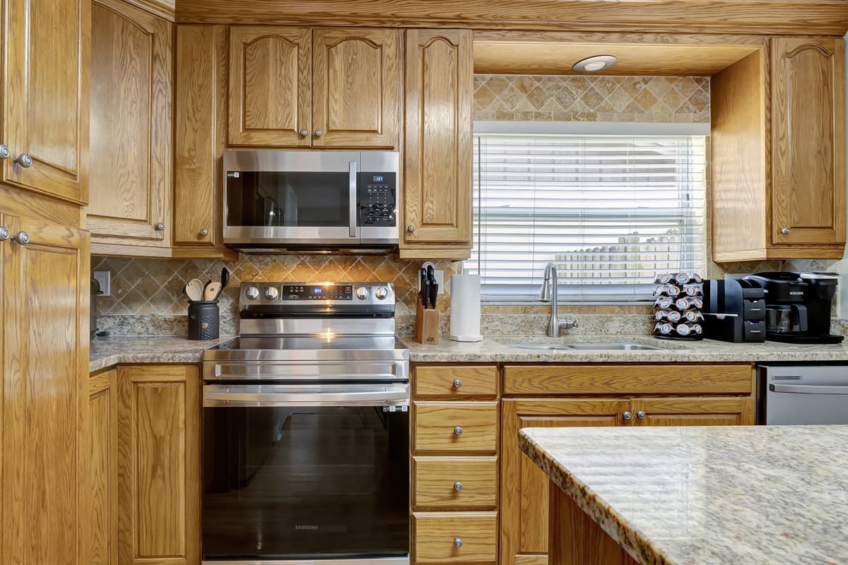 Our kitchen is crafted with solid wooden cabinets, this culinary haven exudes warmth and sophistication.