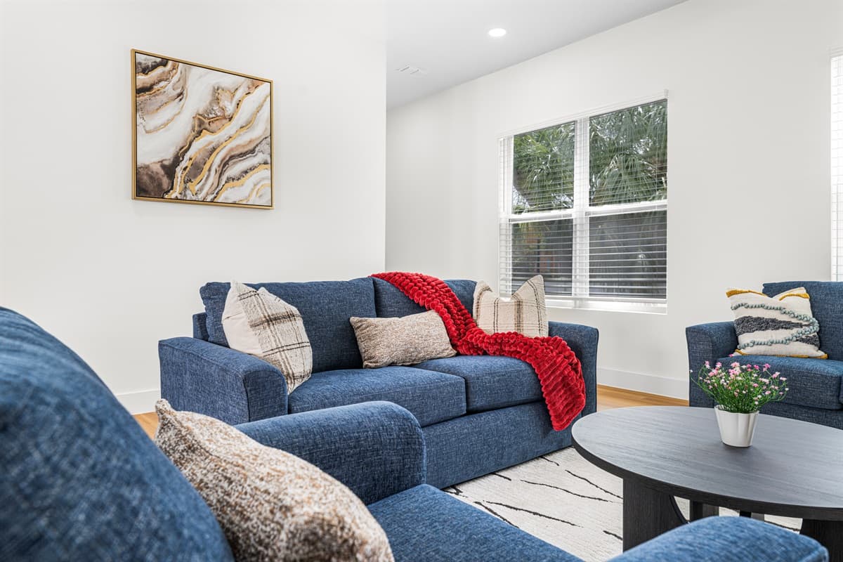 Close-up of comfortable seating with modern accents and relaxing ambiance.