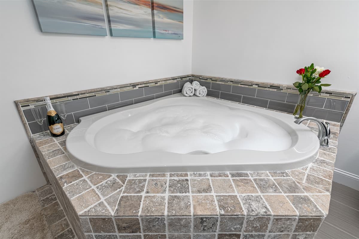 From the luxurious soaking tub to the sumptuous finishes, every detail is designed to elevate your self-care routine.